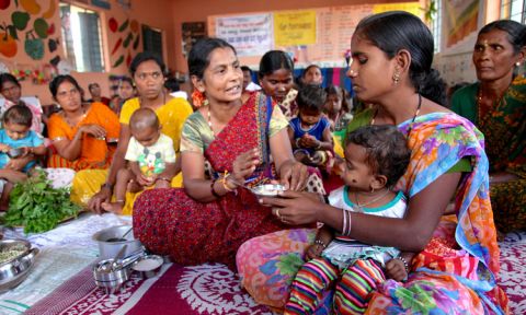 Women discuss food and nutrition during a meeting of Sneha Shivir, a community based care and nutrition counselling initiative for mothers and care givers.
