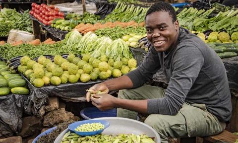 Vegetable vendor at a Lilongwe, Malawi, market