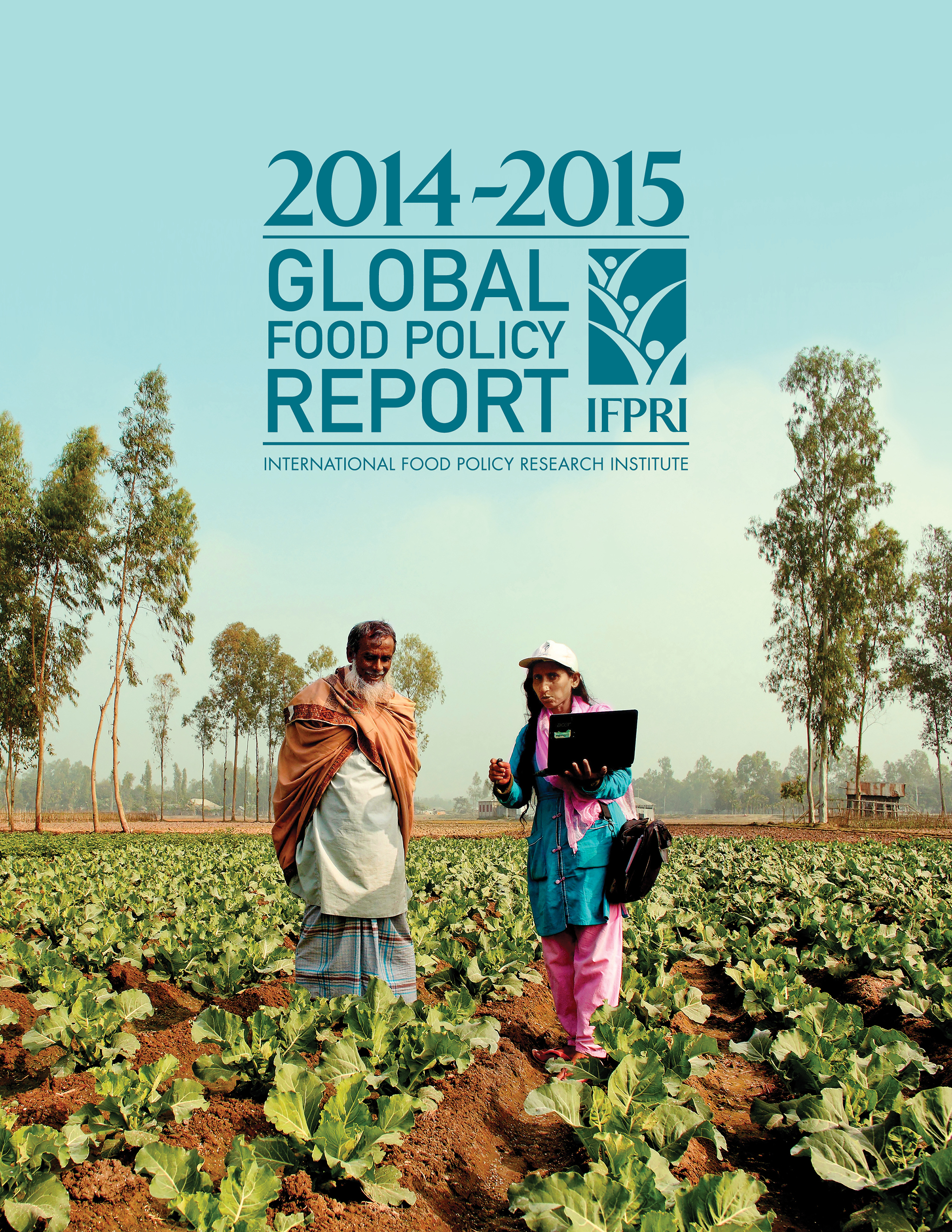 Cover image of 2014-2015 Global Food Policy Report shows man and woman with laptop talking in a planted field