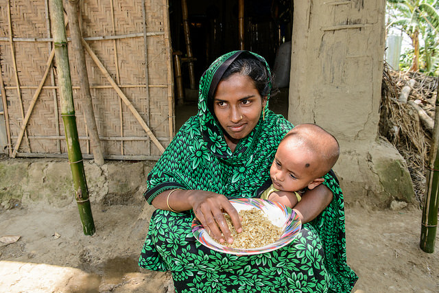 mother-eating-fish-chutney-in-sunamgunj-bangladesh