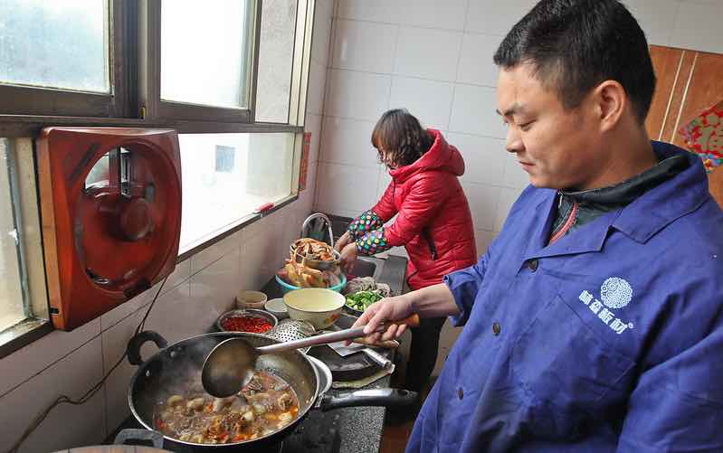 Man and woman preparing food